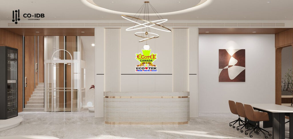 Khu vực lễ tân được thiết kế hiện đại với tông màu sáng, nổi bật logo thương hiệu và đèn trần nghệ thuật làm điểm nhấn