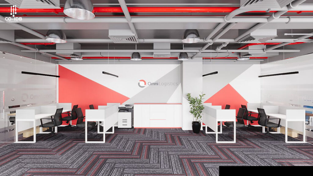 Ảnh chụp một văn phòng làm việc hiện đại với các dãy bàn màu trắng và ghế xoay đen.