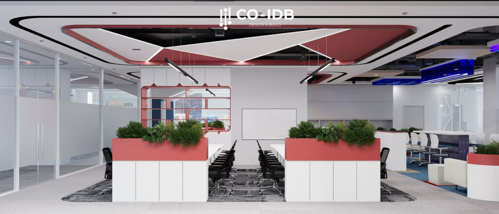 Không gian văn phòng tận dụng cây xanh làm vách ngăn phân chia giữa các cụm bàn